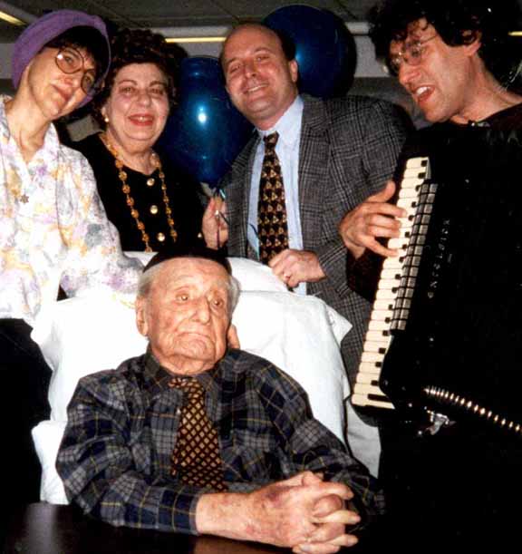 Ben Gailing, Hanukkah 1998, 100th Birthday Party. Behind Ben, left to right: Donna Halper, Edith Perry, Mark David, Hankus Netsky